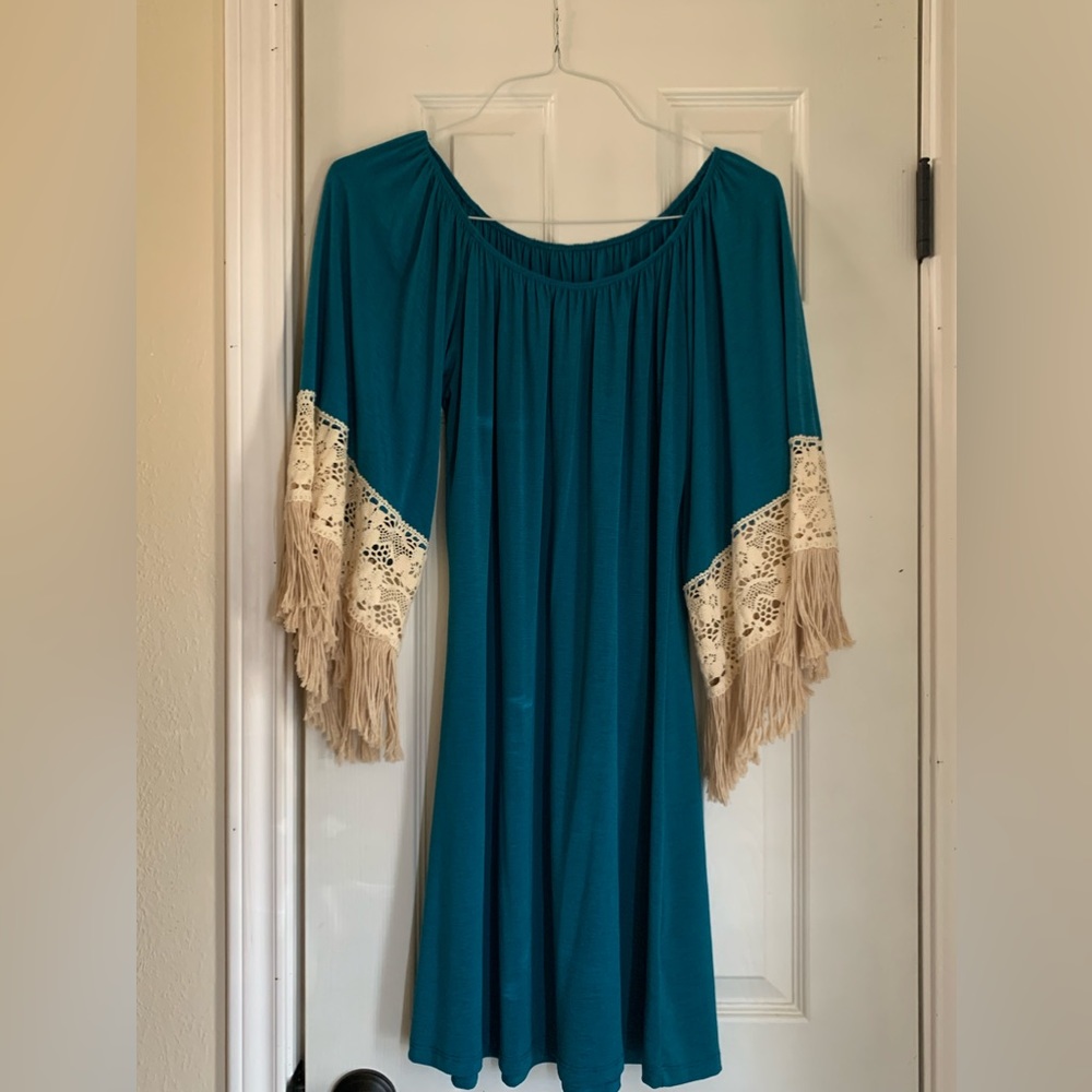 Teal dress with lace and fringe sleeves